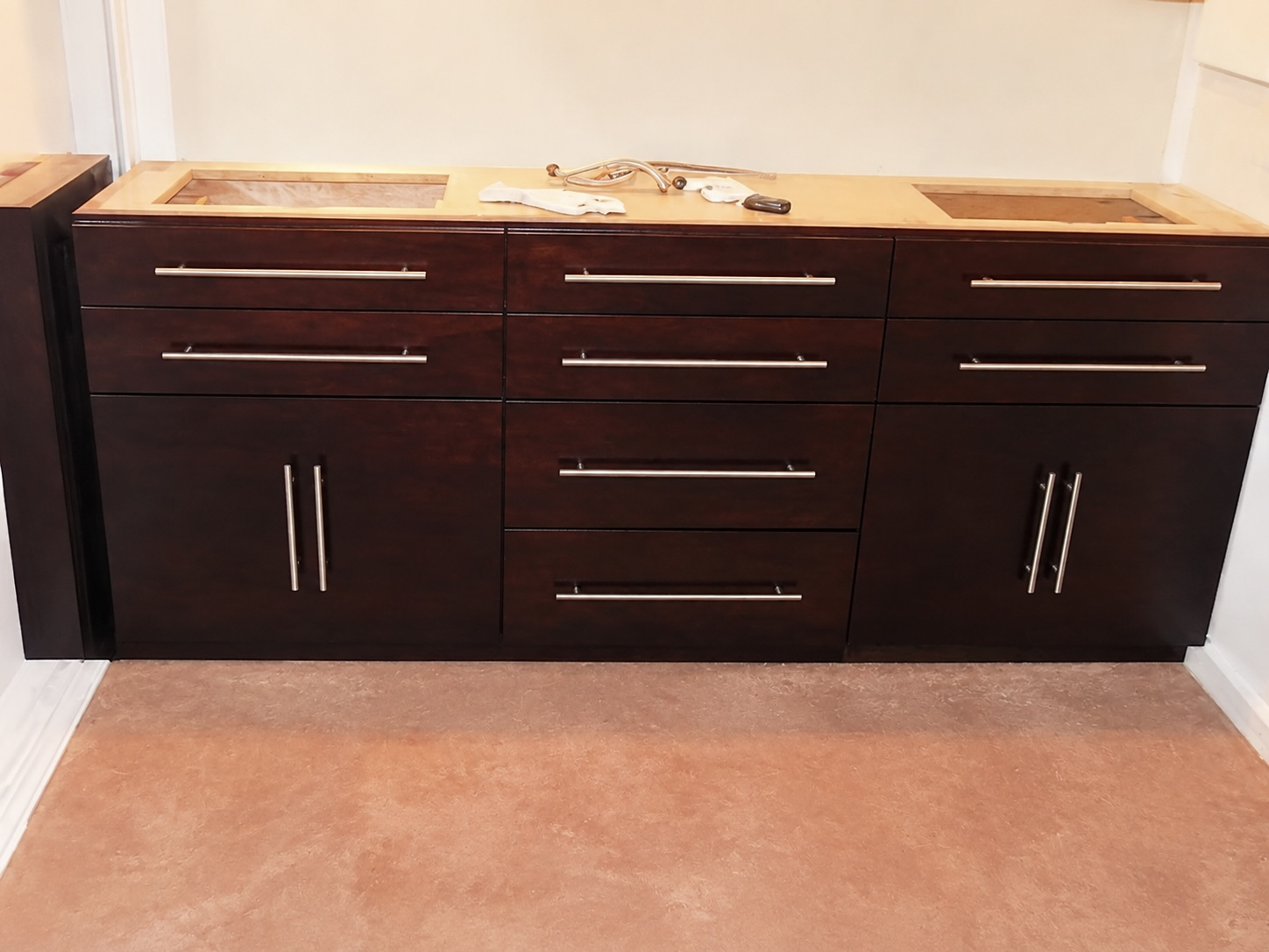 Espresso double vanity cabinet with flat-panel doors and bar pulls